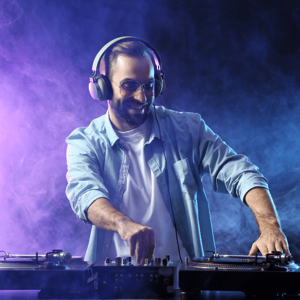 BSE DJ mixing music at a school dance