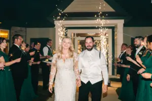 Couple walking out after a wedding