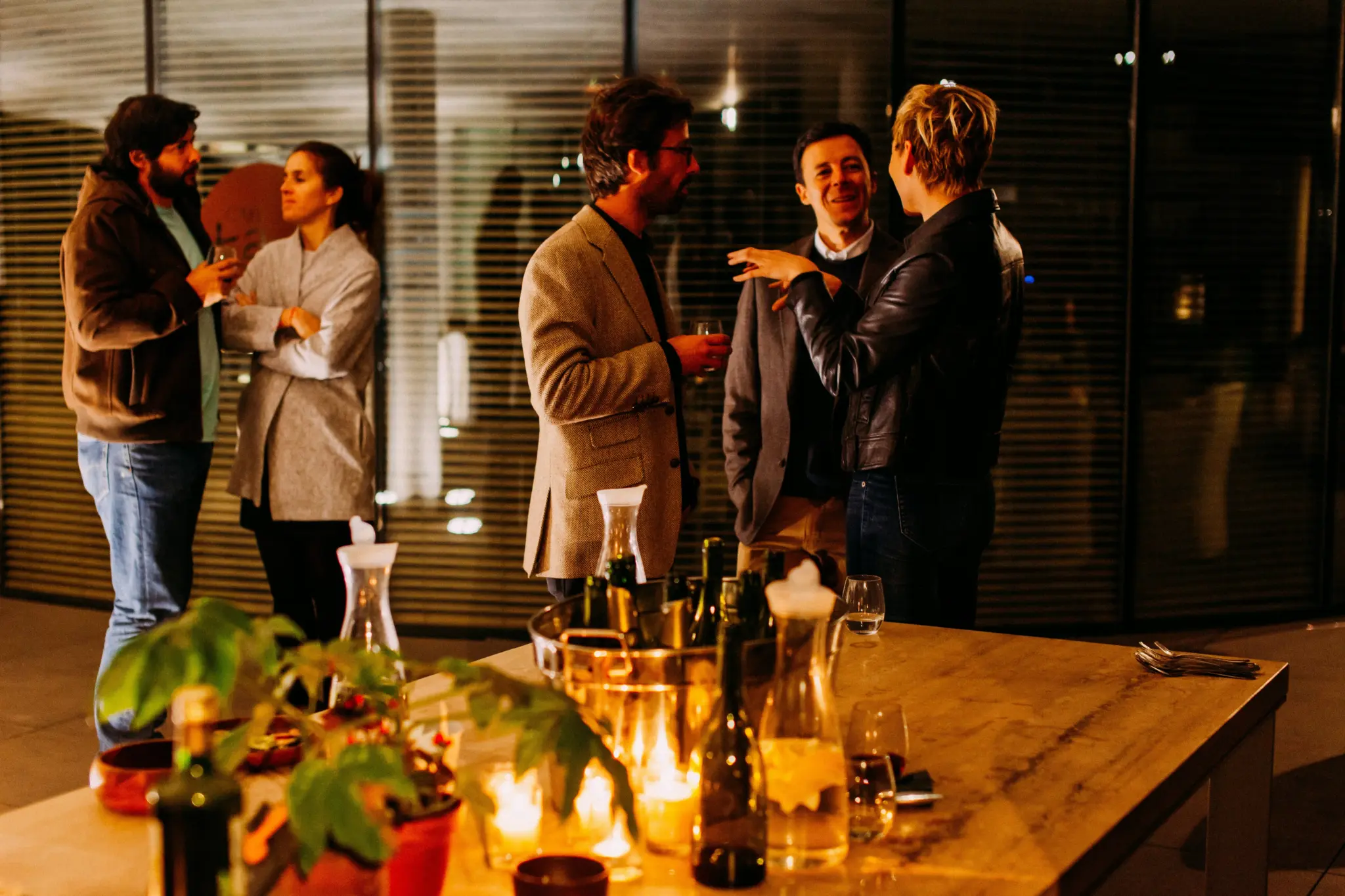 photo of people talking to each other while drinking for corporate event decoration ideas
