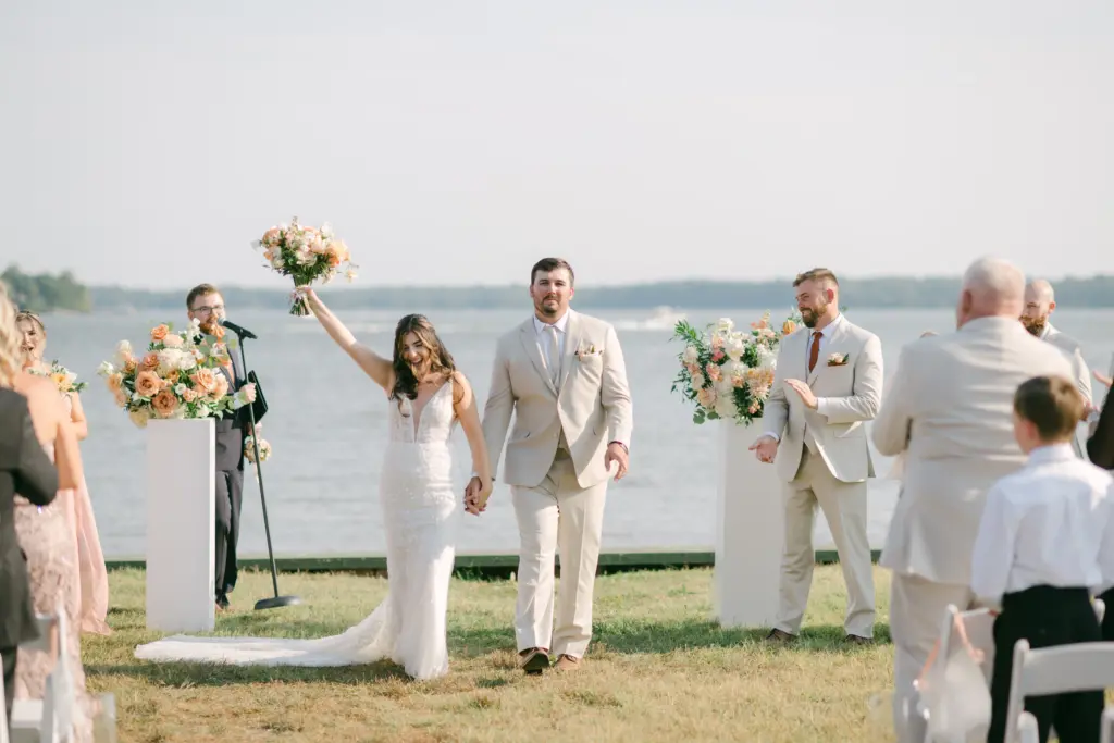 photo of a bride and groom after they were announced husband and wife at a beach venue