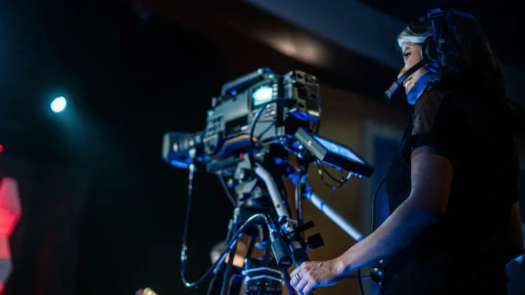 photo of a girl working a video camera for video production for virtual events