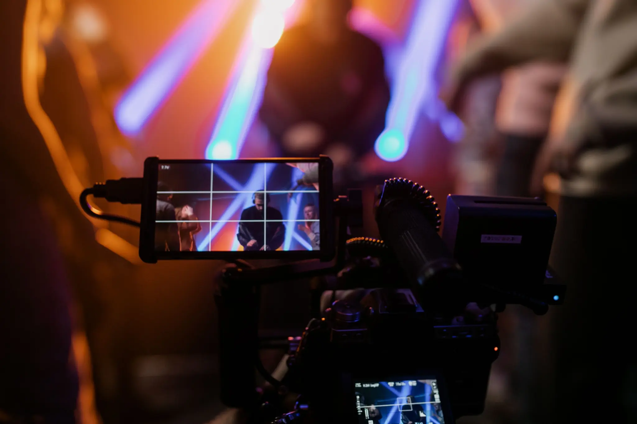 photo of a video camera recording an event