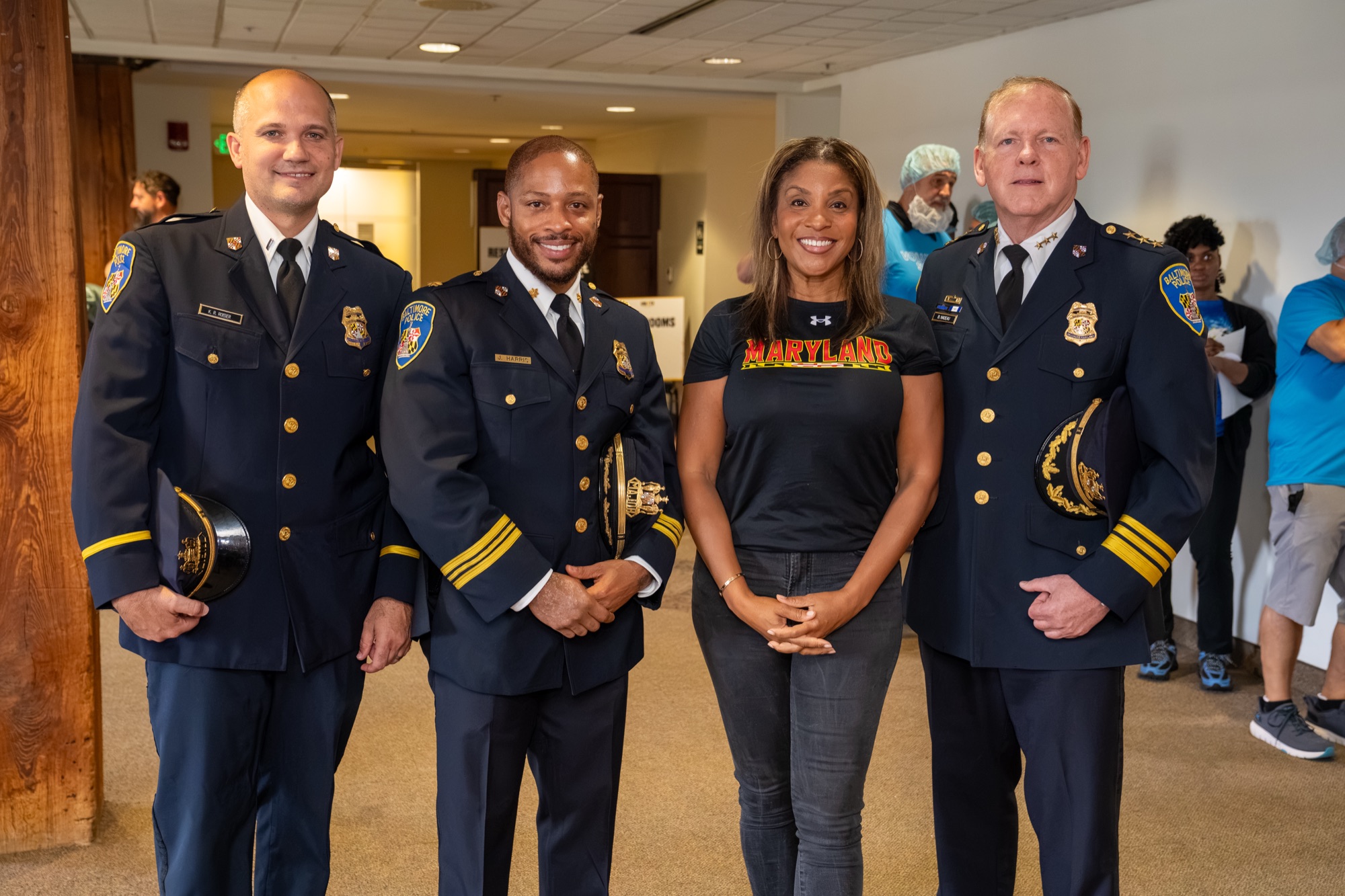 Baltimore police leaders with an organizer at the 9/11 Day meal pack