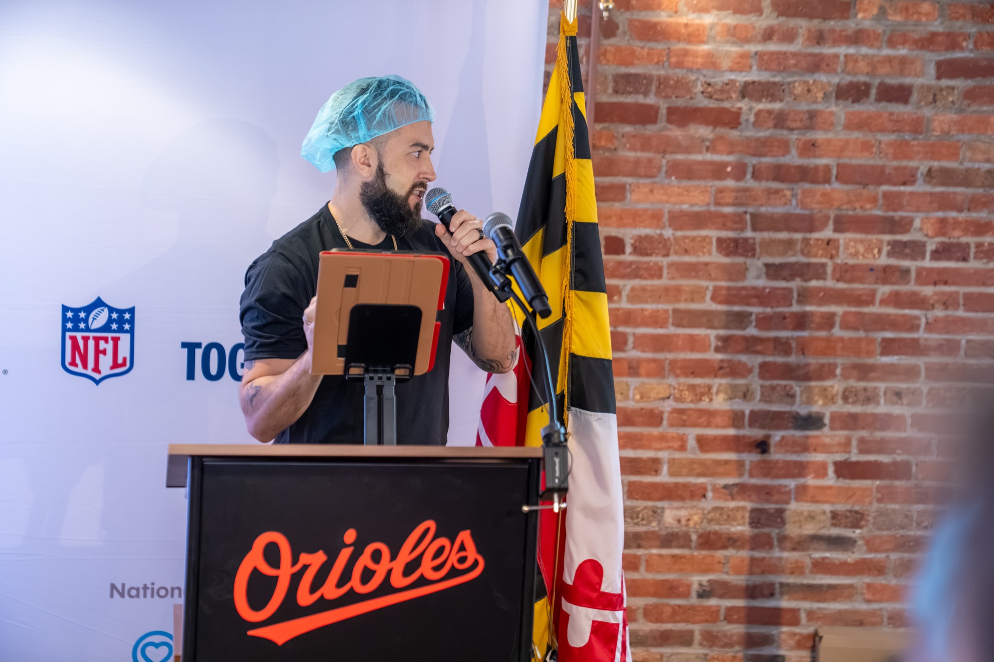 Speaker at the Orioles podium during the program