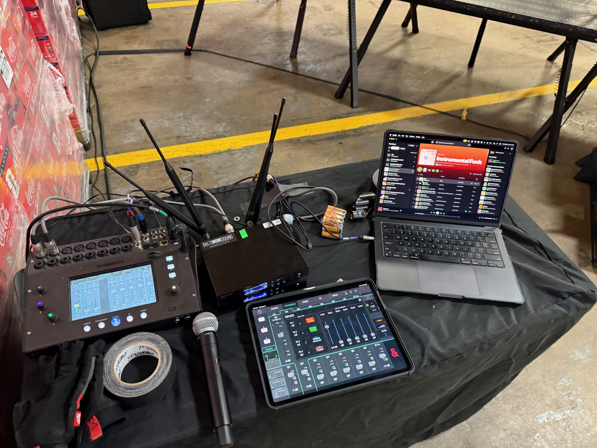 BSE audio position with an Allen & Heath CQ mixer, iPad control, a wireless handheld mic and a laptop for walk-in music