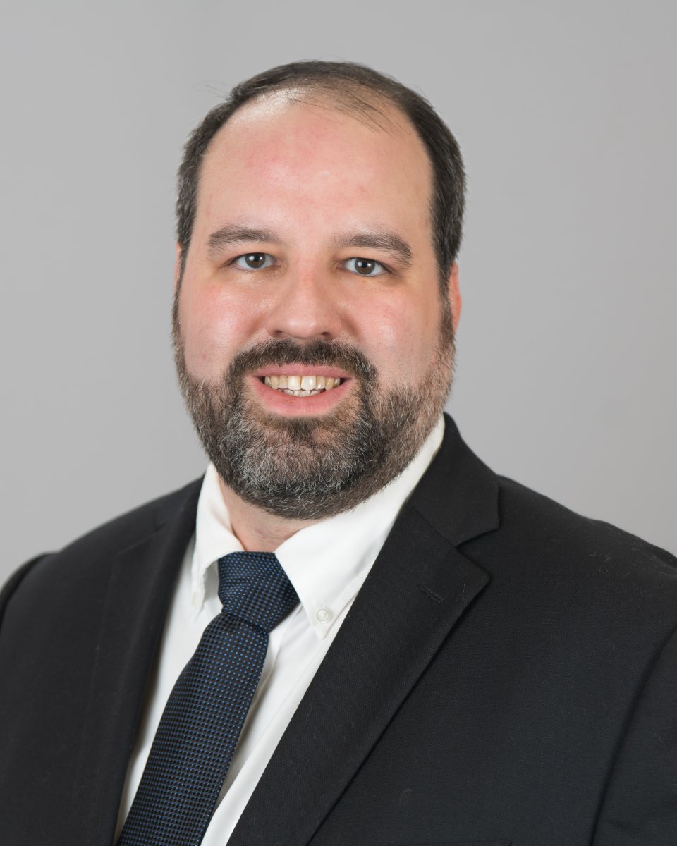 Corporate headshot photographed on-site by Baltimore Sound Entertainment