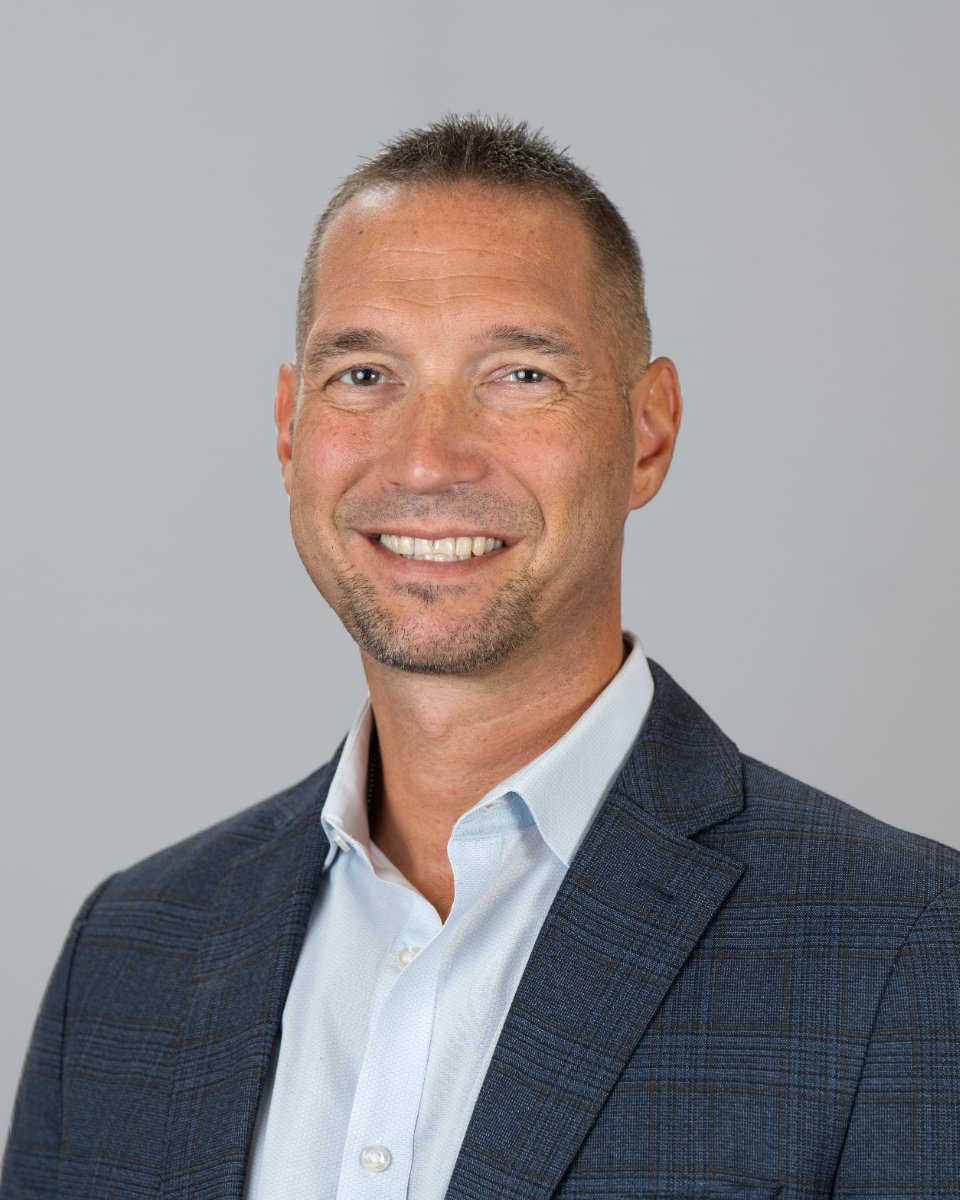 Corporate headshot photographed on-site by Baltimore Sound Entertainment