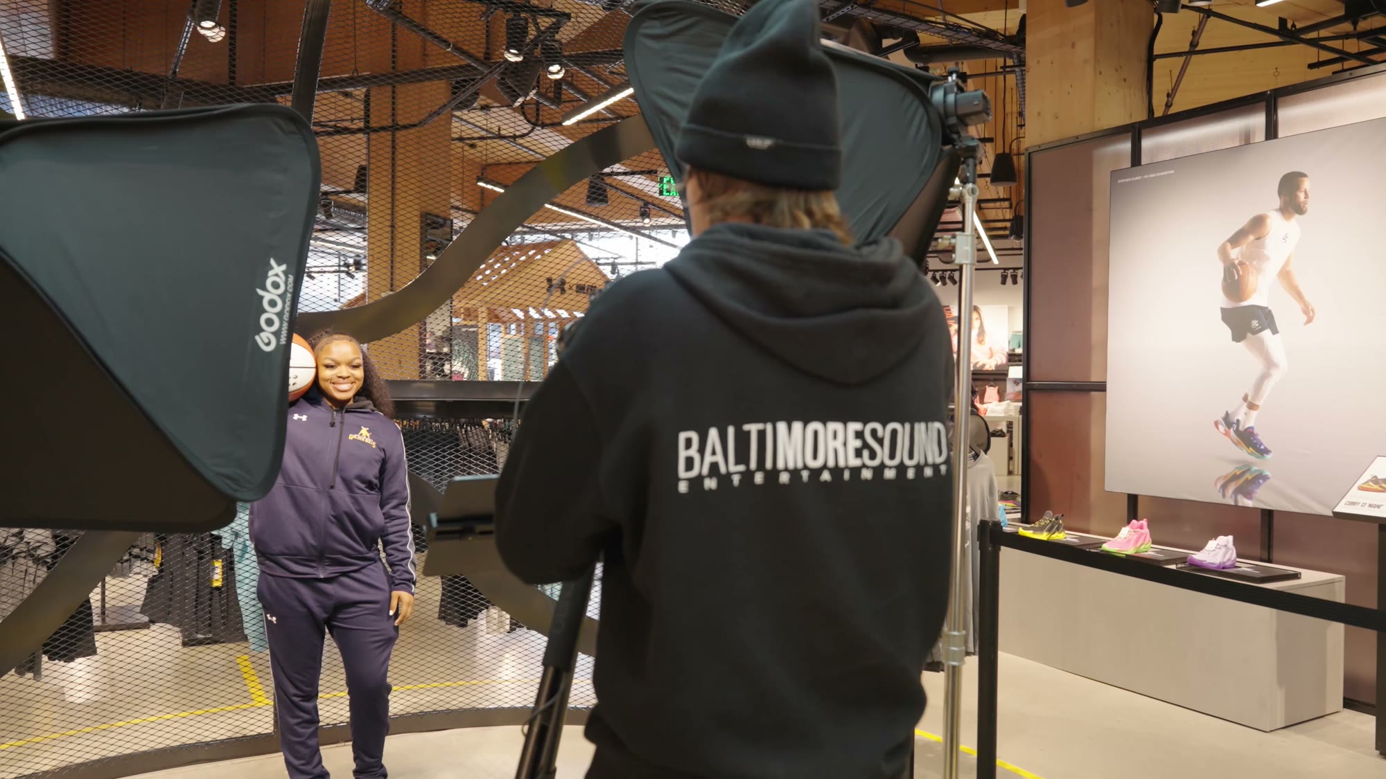 Baltimore Sound photographer shooting a guest at the Under Armour flagship